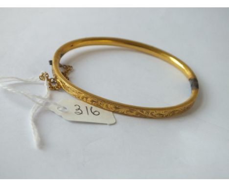 Rolled gold bangle crispy engraved with scolls      