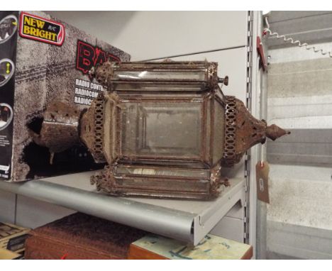 An ornate Moroccan style glass lantern