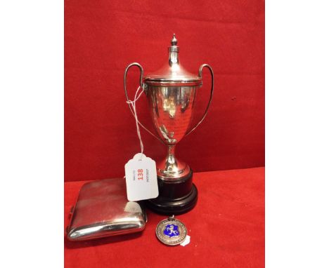 A silver trophy cup for the Henry Rowe Challenge, awarded to 'A. Walters', a Kent Schools silver football medallion awarded t