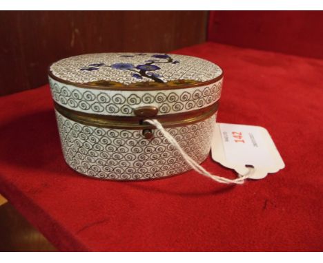 An early 20thC cloisonne trinket box, the hinged lid with push button lock and decorated with blue prunus     two ships to en