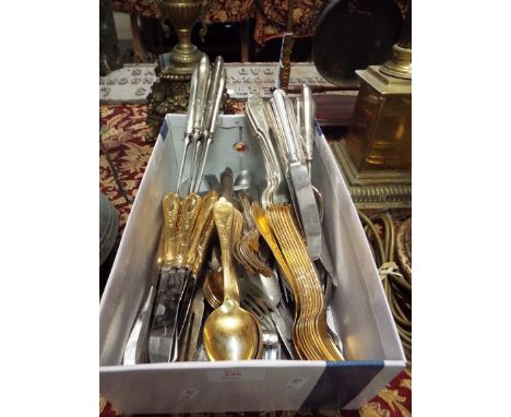 A quantity of vintage gold and silver plated cutlery