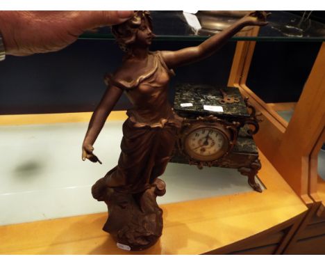 A 19thC French marble and gilt metal mantel clock with floral enamel dial and Arabic numerals surmounted by a spelter figure 