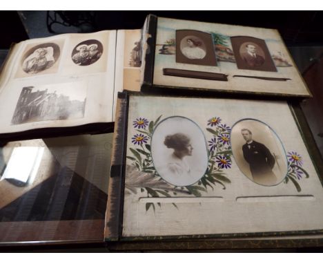 An album containing Victorian and later photographs together with a scrap album containing mainly architectural scenes