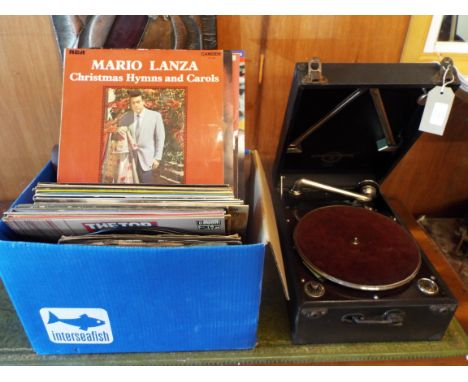 A mixed selection of vintage records and a gramophone