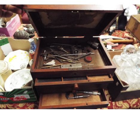 A late Victorian mahogany specimen chest of six graduated drawer housing engineer's tools to include micrometers, lathe acces