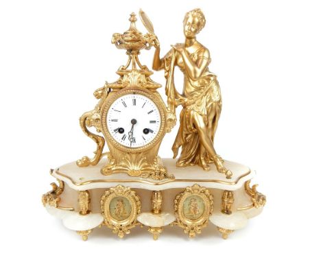 A 19th century alabaster and gilt metal figural mantle clock, white enamelled dial with black painted Roman numerals and twin