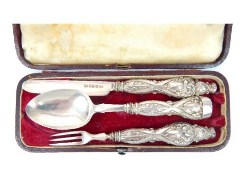 A cased mid Victorian silver three piece Christening set, George Unite, London 1850, comprising knife, fork and spoon, the ha