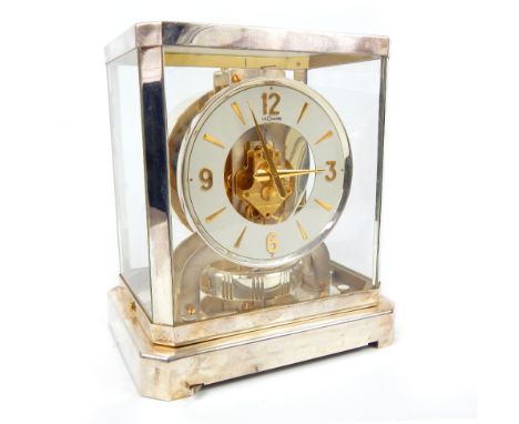 A Le Coultre Atmos four glass clock in a chrome frame, model number 136846, with baton and Arabic numerals to the chapter, ra