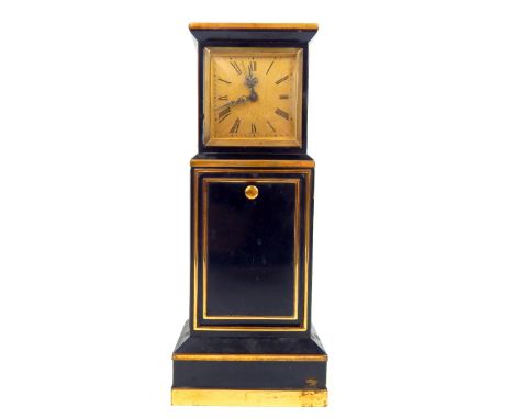 An early 20th century painted brass miniature 'grandfather' alarm clock, the brass dial with black painted Roman numerals and