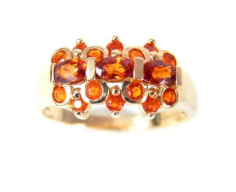 A 9ct yellow gold fire opal set dress ring, overall weight 4.3g