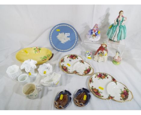 A good lot of seventeen ceramic pieces to include two pieces of Royal Albert Old Country Roses, a small Belleek cup, two smal