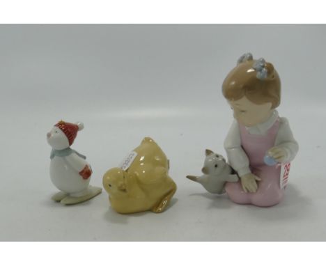 nao figure of a girl with a kitten: 1519 together with a snowman ski-ing and a chick 