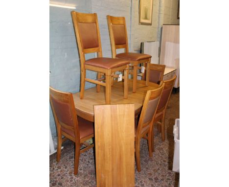 Modern, quality extending dining table and 6 chairs: honey oak finish, table extends to 190cm. 