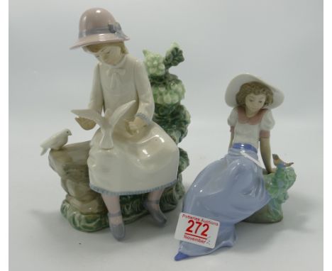 Two Nao Figures: one of a girl on a bench together with  a girl sitting down with a bird (2) 