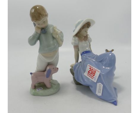 Nao figurine of a girl watching a bird: together with a boy with a dog 