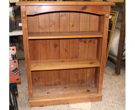 Oak three shelf book case: 116cm h x 91cm wide x 31cm deep 