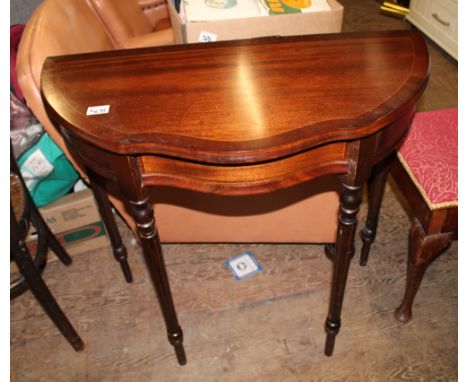 Inlaid mahogany demi lune side table: single drawer, raised on fluted supports, 82cm wide x 40cm deep x 76cm high. 