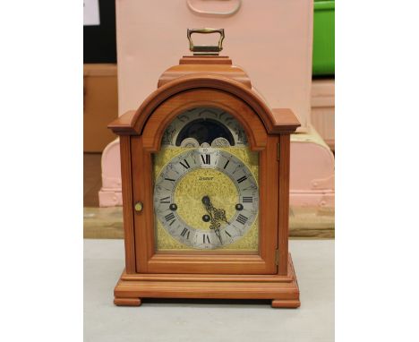 A Keininger mantle clock: cherry wood case. 