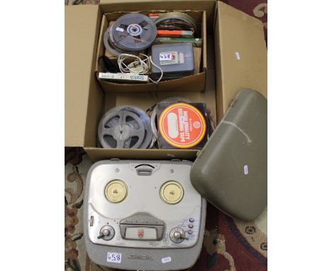 A Grundig TK24 reel to reel tape recorder: together with a quantity of tape reels. 