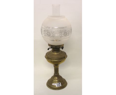 Vintage brass oil lamp: with shade and chimney, height 58cm. 