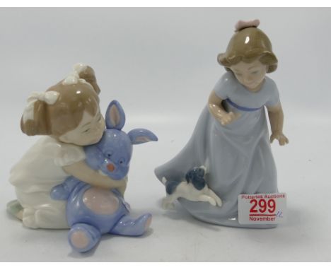 Nao figure of a girl with a dog: together with a girl cuddling a rabbit (2) 