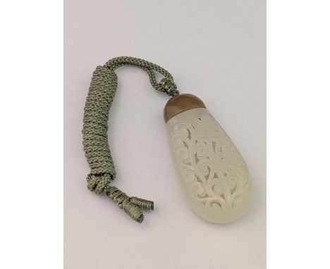 A Chinese Hetian Jade incense bag with pierce work decoration