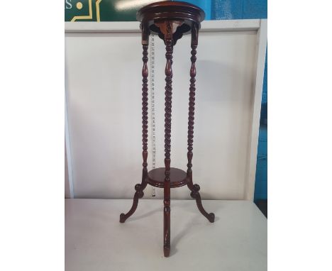 A mahogany planter stand with four barley twist columns H100cm, shipping unavailable