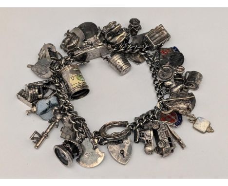 A 925 silver charm bracelet 98.60g