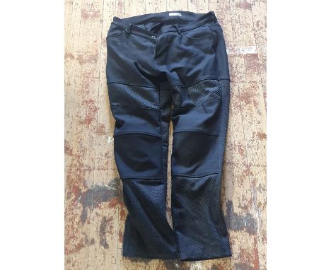 A pair of new Knox motorbike trousers 40w 33L