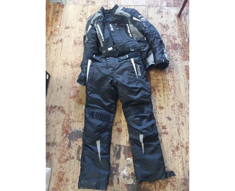 A new Buchii motorbike jacket and trousers size XXL