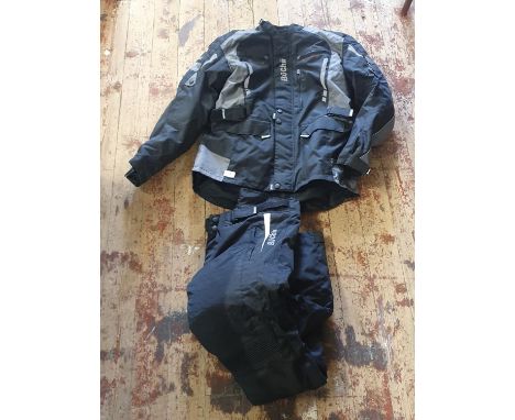A new Buchii motorbike jacket and trousers size XXL