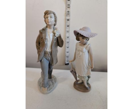 Two Nao figurines, shipping unavailable