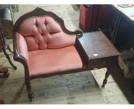 A vintage wooden telephone seat with red upholstery L100xH90cm, shipping unavailable