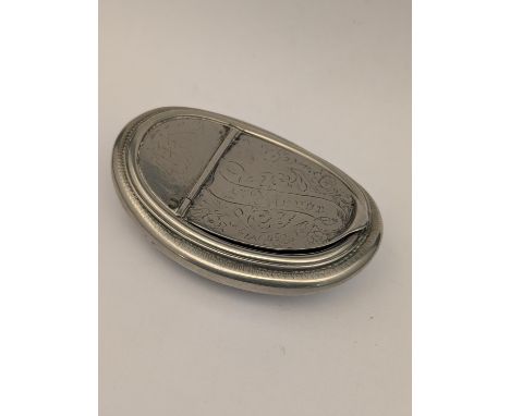 A antique white metal snuff box