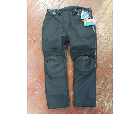 A pair of Texpeed motorbike trousers size 18R