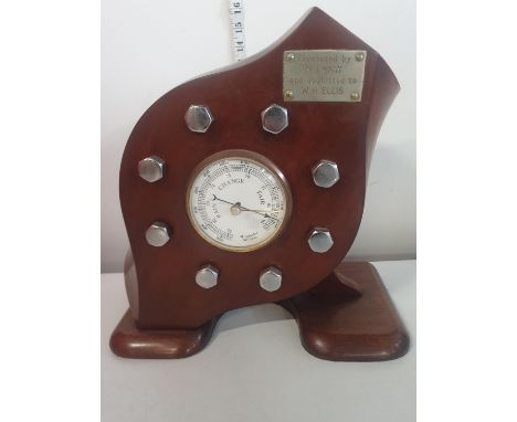 A WW1 period wooden propeller hub which has been converted into a barometer