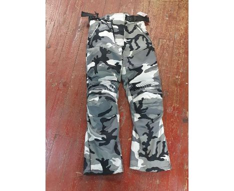 A pair of JTS motorbike trousers size 12