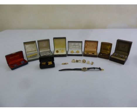 A quantity of cufflinks and tie pins to include Dunhill and Gucci (10)