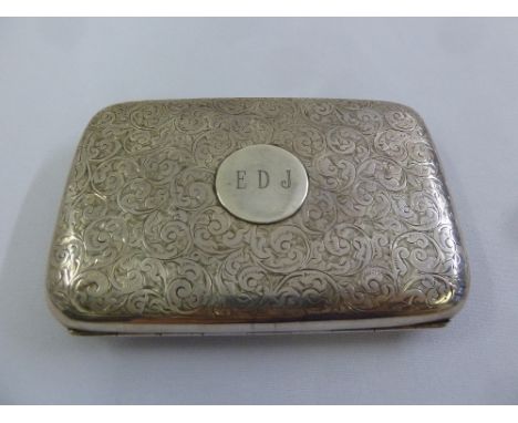A silver cigarette case with leaf engraved hinged cover, Birmingham 1904