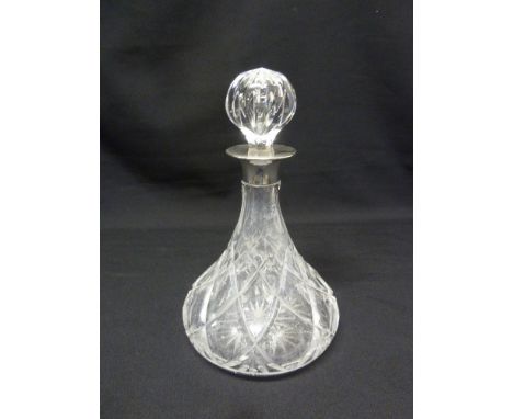 A ships decanter pear shaped with drop stopper and silver collar