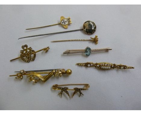 A quantity of gold jewellery to include five brooches and three tie pins, approx total weight 20.7g