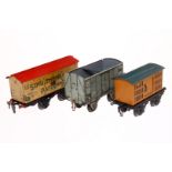 3 versch. Güterwagen, Spur 1, Kraus und Carette, starke Alterungsspuren, 1 Dach fehlt, Z 3