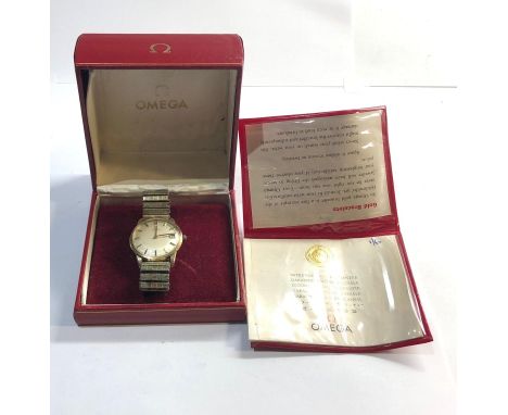 Vintage 9ct gold Omega automatic gents wristwatch in non working order, crown not original Omega, boxed and booklet but no wa