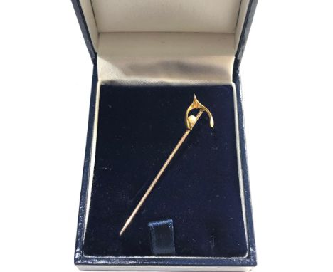 Gold wish bone and pearl stick pin 