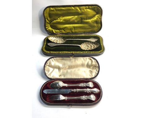 Antique boxed silver berry spoons and boxed silver knife fork and spoon 