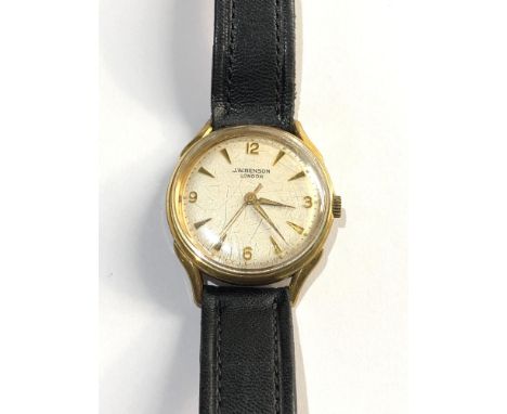 Vintage J.W.Benson gents wristwatch the watch winds and ticks but no warranty given 