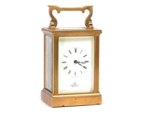 VICTORIAN SWING HANDLED BRASS CARRIAGE CLOCK, MARKED IMPERIAL TO FRONT DIAL WITH GLASS PANEL SIDED AND BACK HEIGHT: 4.5 INCHE