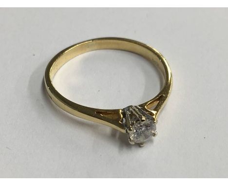 Gold (marks rubbed) diamond solitaire ring