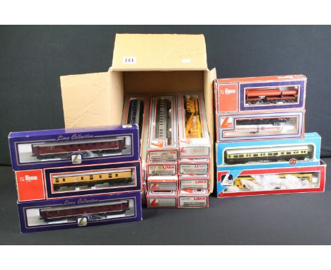 18 Boxed Lima OO gauge items of rolling stock to include coaches, car transporters and tankers, some box wear 