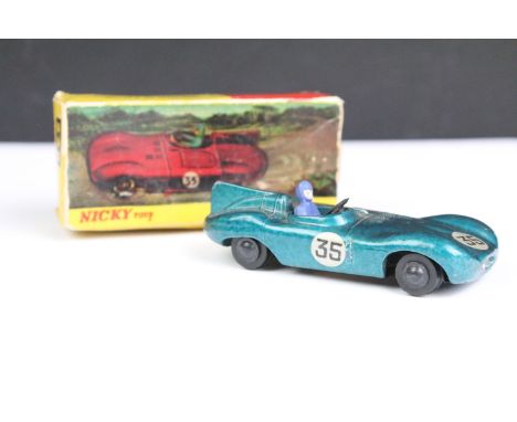 Boxed 238 Dinky Nicky Toys Jaguar D Type in green with racing No. 35 stickers to bonnet and on both sides, with figure driver